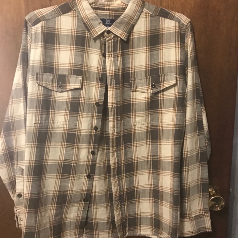 Lightweight flannel . Very comfy. Button closures